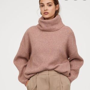 Pink turtleneck sweater